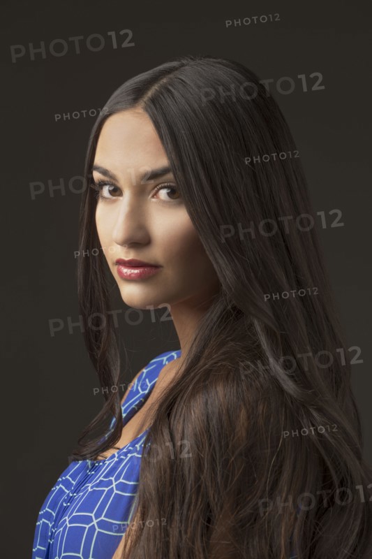 Portrait of serious Mixed Race woman