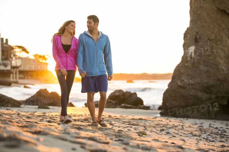 Couple walking on beach