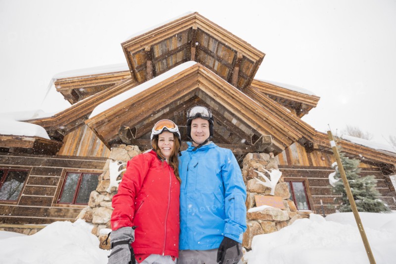 Portrait of smiling Caucasian couple on winter vacation