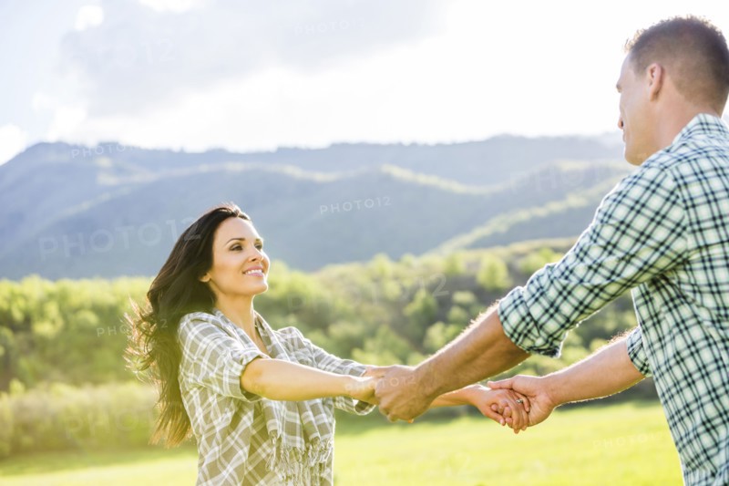 Couple dancing in park