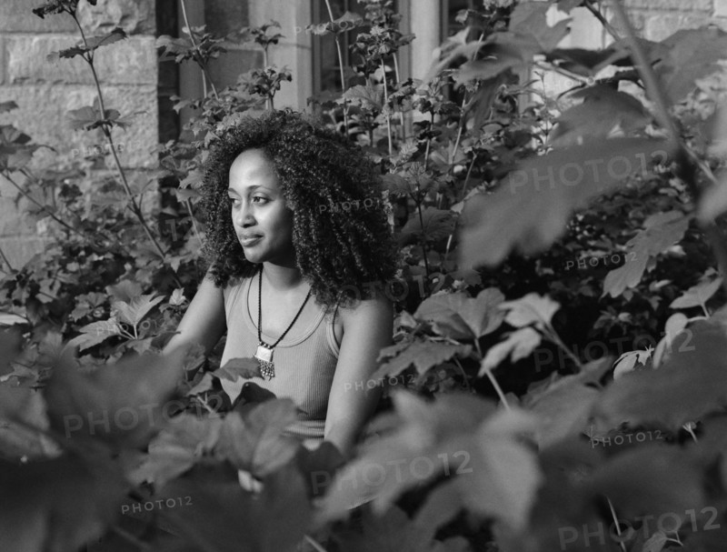 Mixed race woman in garden