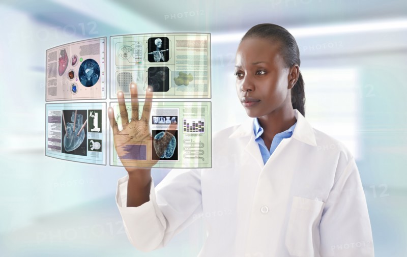 African American doctor using digital display
