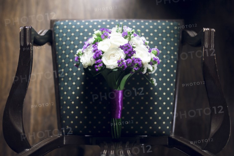 Bouquet of flowers on chair
