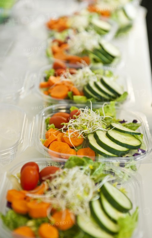 Sliced vegetables in plastic containers