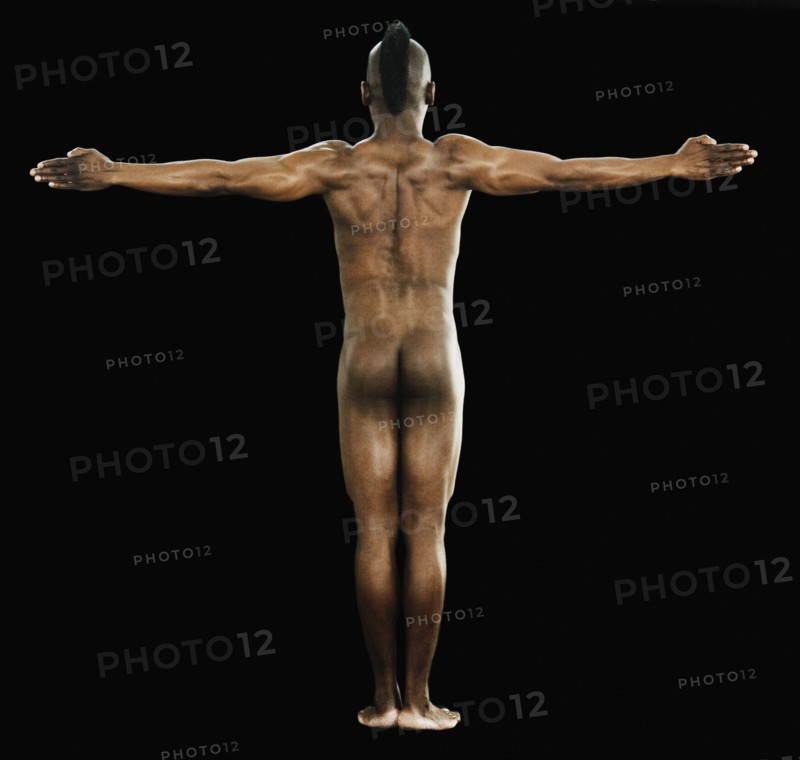 Rear view of nude African man