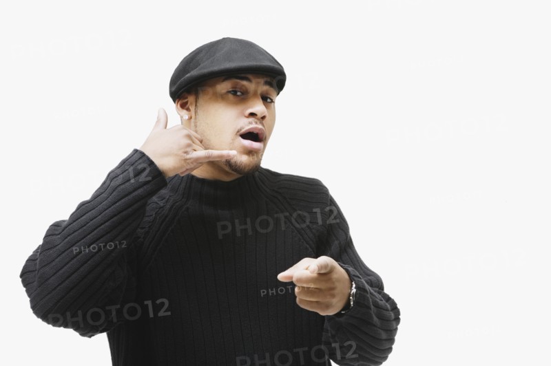African man making telephone hand gesture and pointing