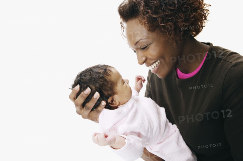 African mother smiling at baby