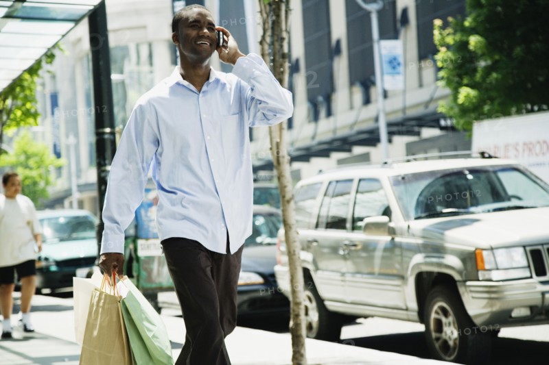 African man talking on cell phone