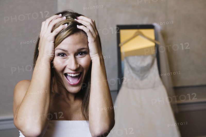 Bride yelling with hands on head