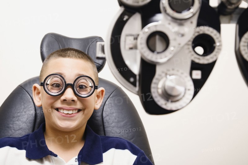 Asian boy in eye doctor's office