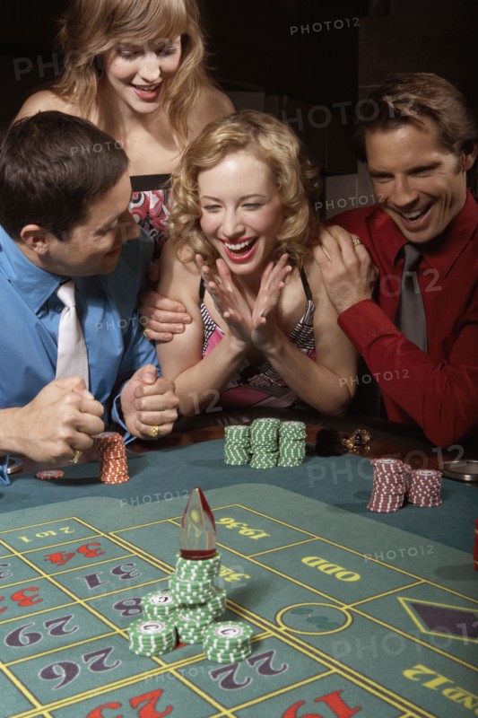 Woman successfully gambling in a casino