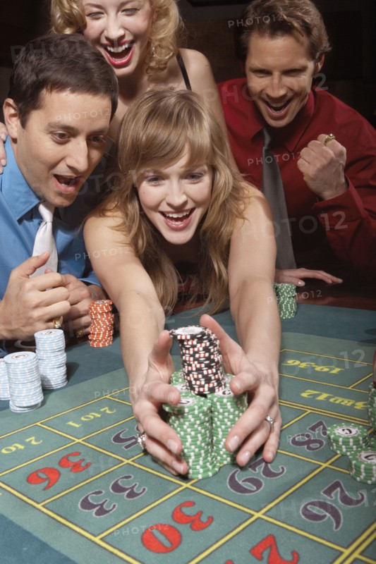 Woman successfully gambling in a casino