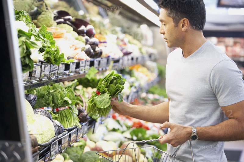 Hispanic man shopping for produce