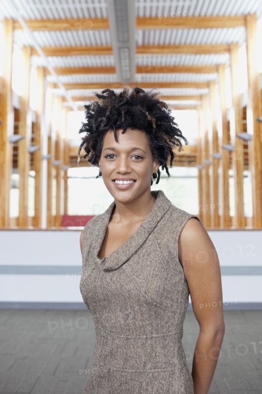 Mixed race businesswoman smiling