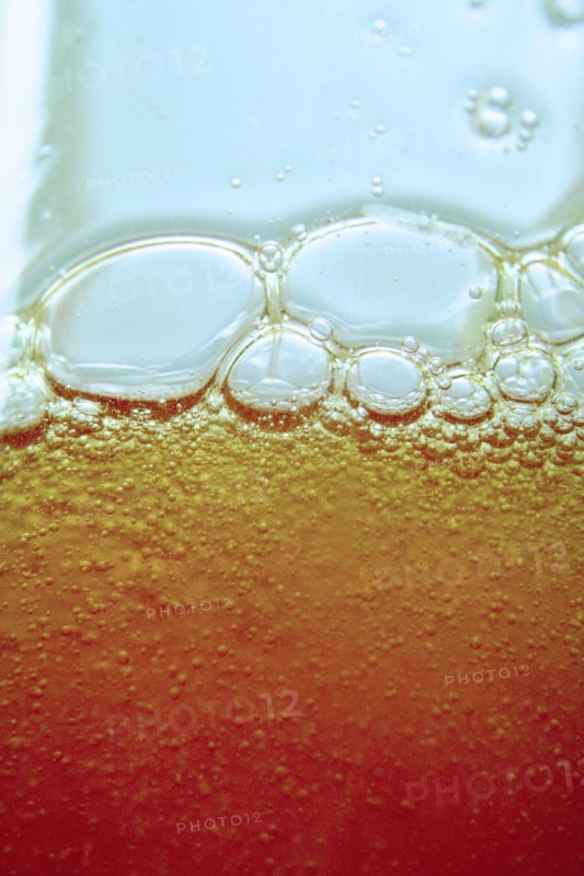 Close up of bubbles in beer glass