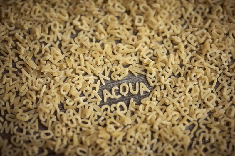 Alphabet noodles spelling acqua