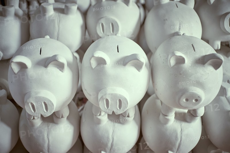 Pile of white piggybanks