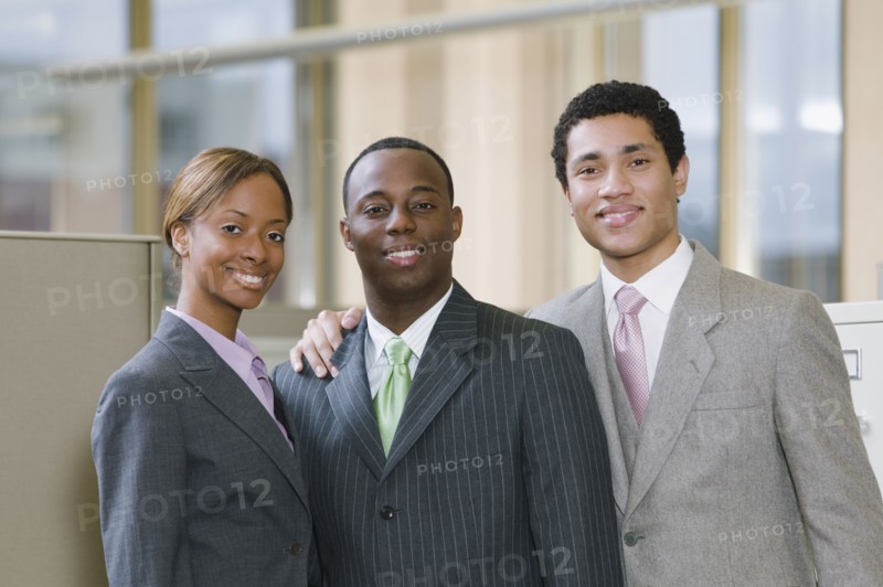 Multi-ethnic business people posing in office