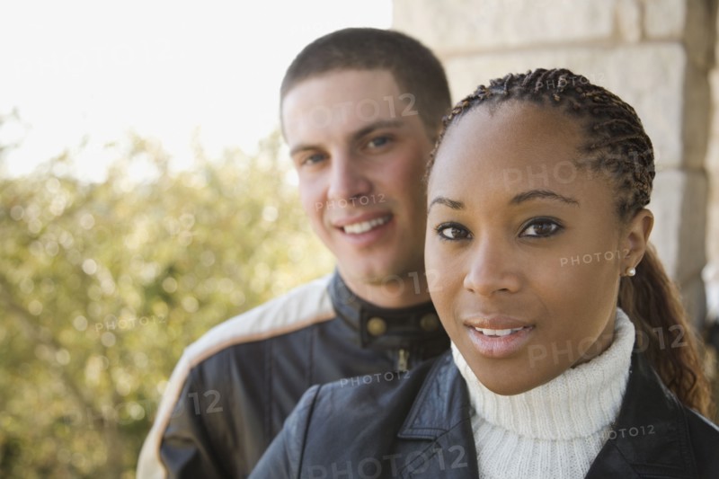 Multi-ethnic couple on balcony