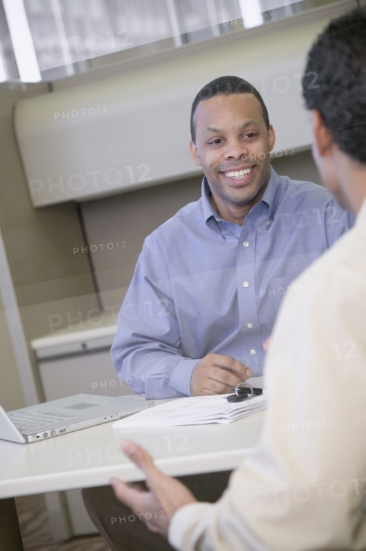 Two businessmen working in office