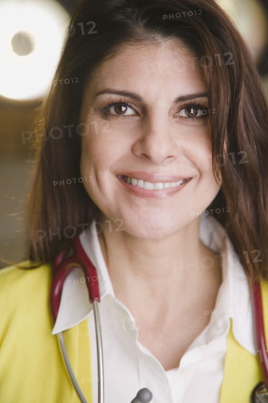Confident mixed race doctor smiling