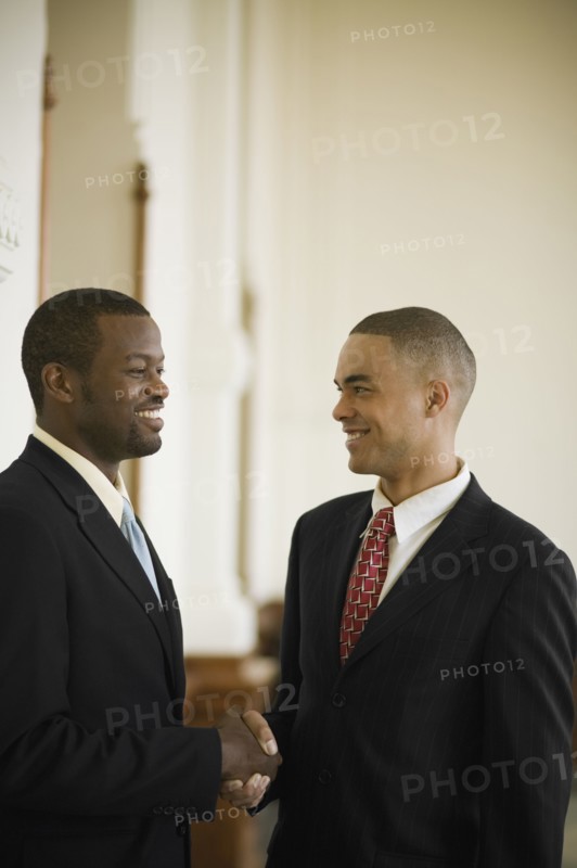 African businessmen shaking hands