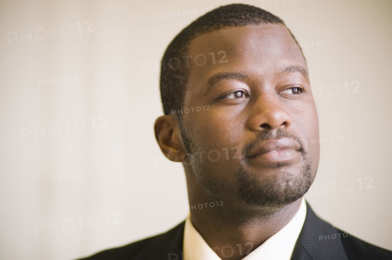African businessman thinking