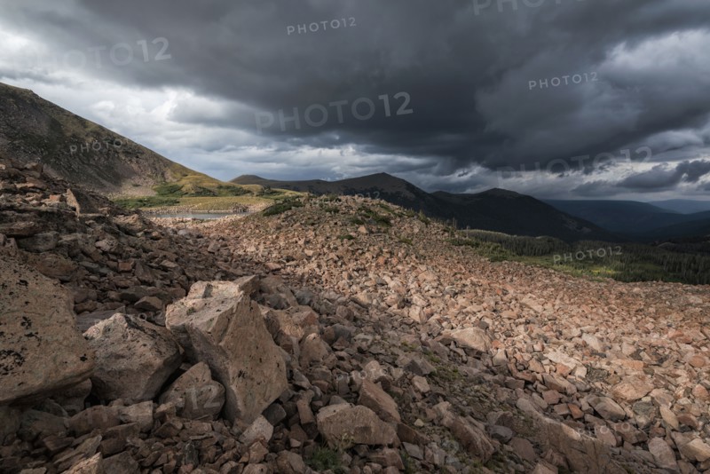 Clouds over rocky landscape