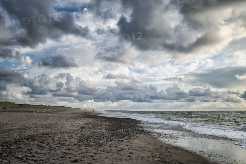 Clouds over ocean beach