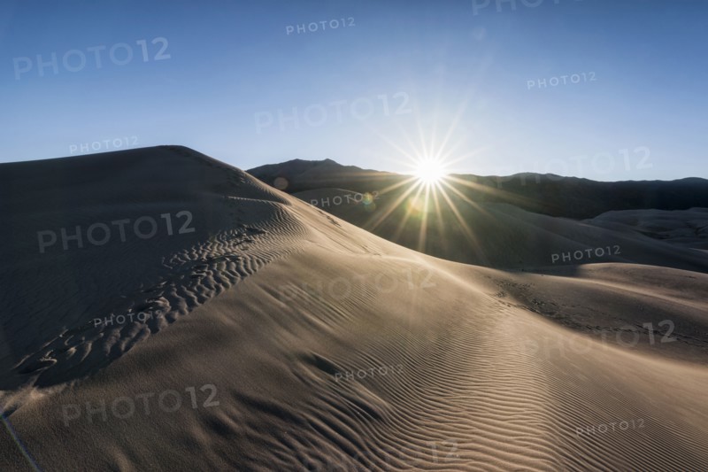 Sunbeams on sand dunes