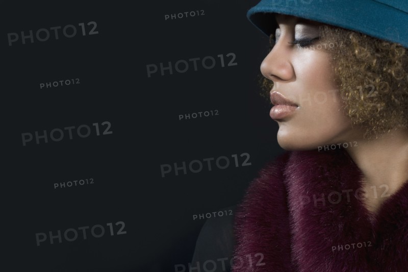 Mixed Race woman wearing hat