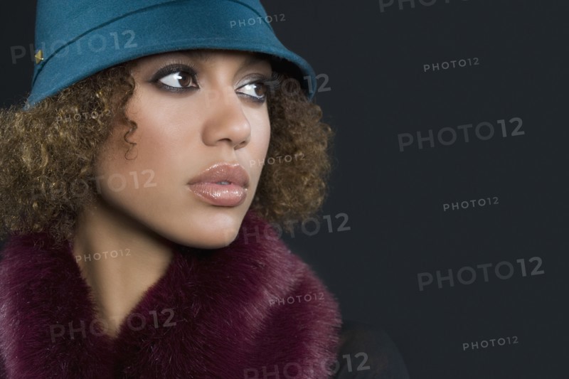 Mixed Race woman wearing hat
