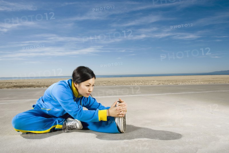 Asian woman stretching