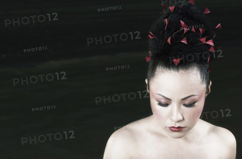 Asian woman with hair up