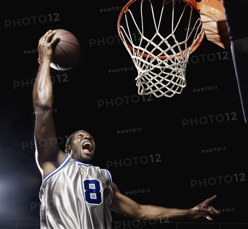 African basketball player scoring