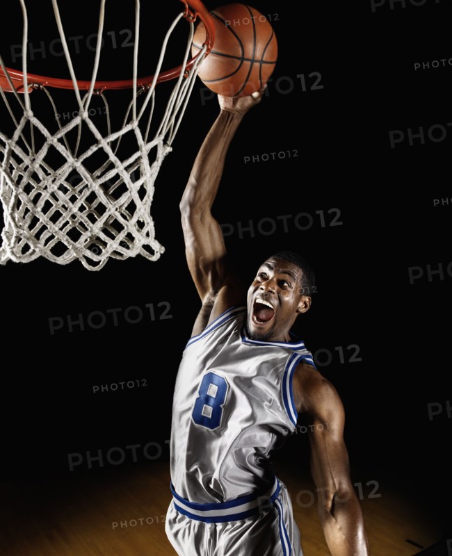 African basketball player scoring
