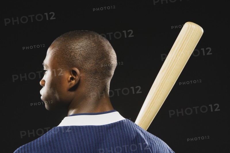 African American man holding baseball bat