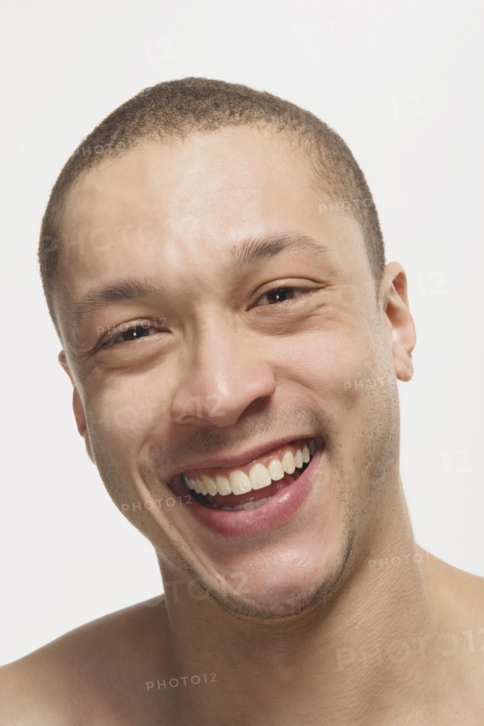 Close up of Mixed Race man laughing