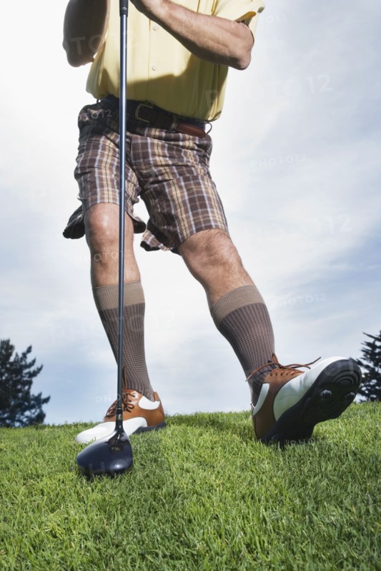 Man holding golf club