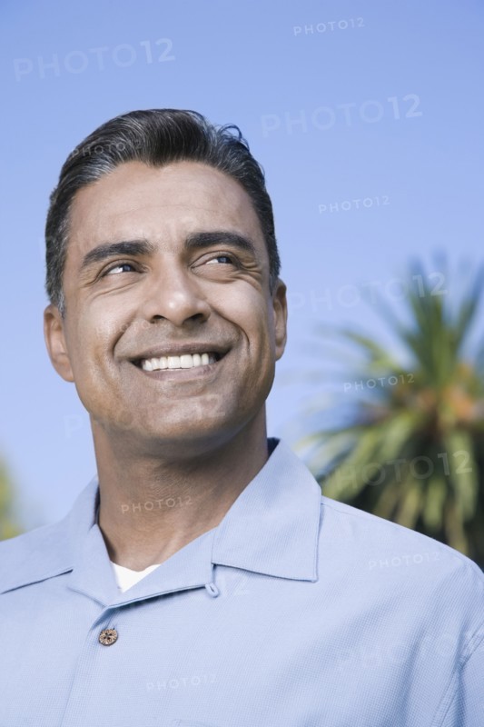 Hispanic man looking sideways