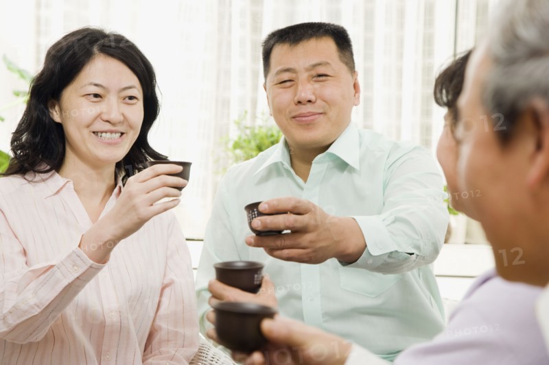Chinese family drinking tea