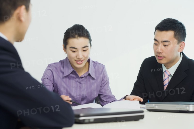 Chinese business people working together