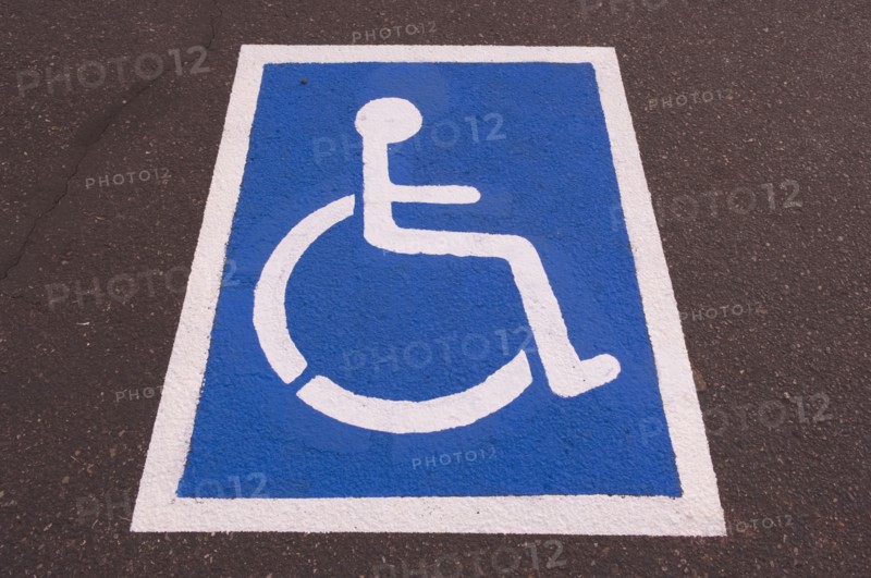 Handicapped symbol painted on pavement