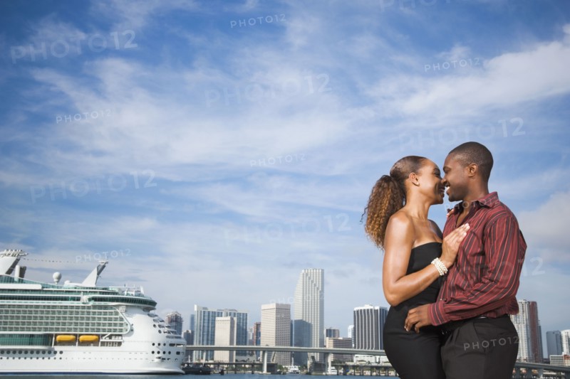 African American couple hugging