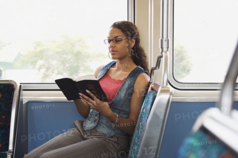 African woman reading bible