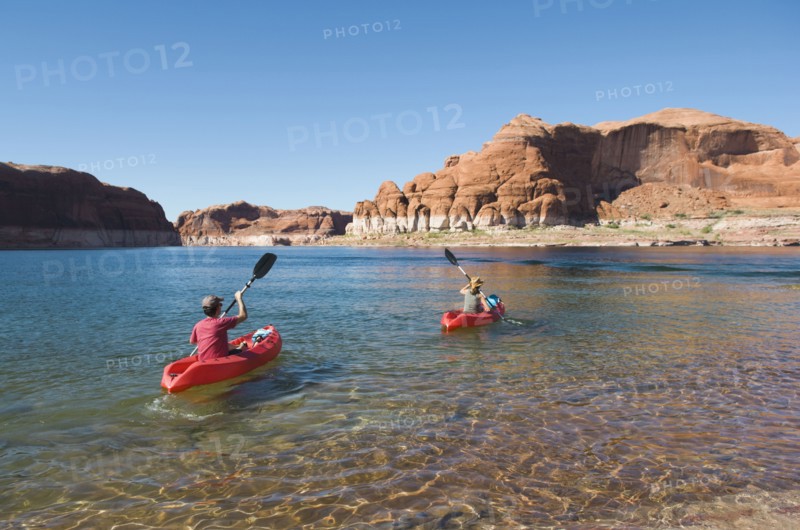People kayaking in lake
