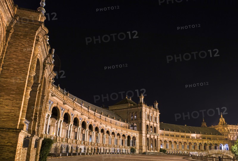 Ornate porticoed building at night