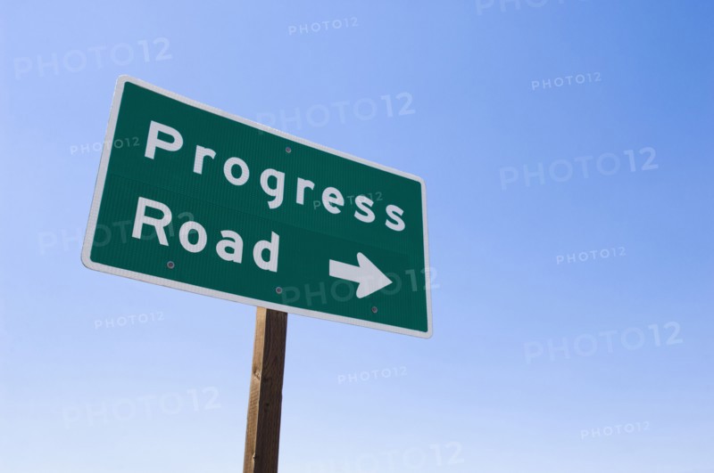 Sign with arrow toward Progress Road
