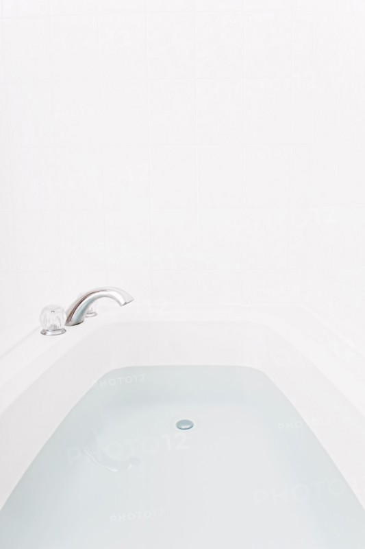 Faucet over full bathtub