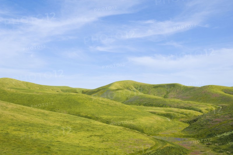 Hills and blue sky in rolling landscape